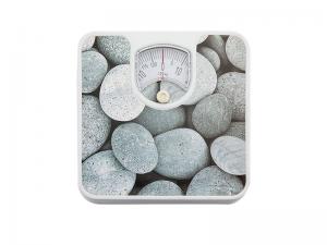 Why does the bathroom scale read differently on a hard surface and on a carpet?